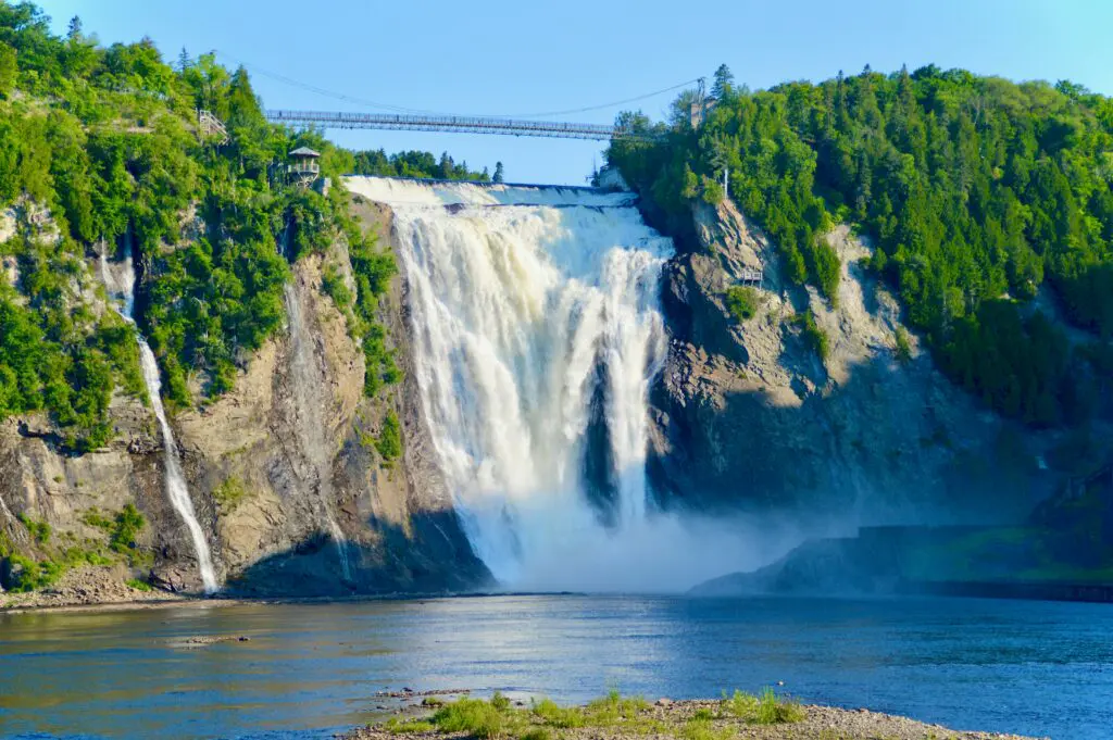 Montmorency Falls thunders into its gorge outside Quebec City in spring, standing a full 30 meters taller than Niagara Falls