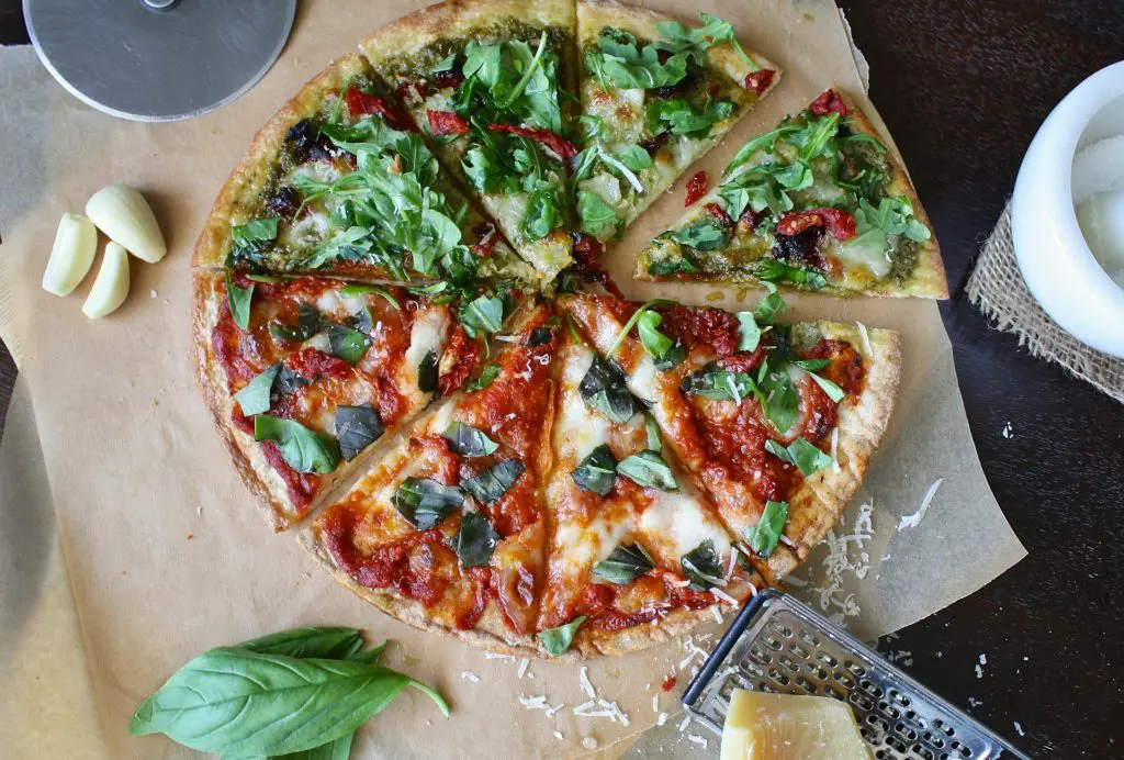 A classic Neapolitan pizza Margherita fresh from the wood-fired oven in Naples, the birthplace of one of the world's most beloved foods