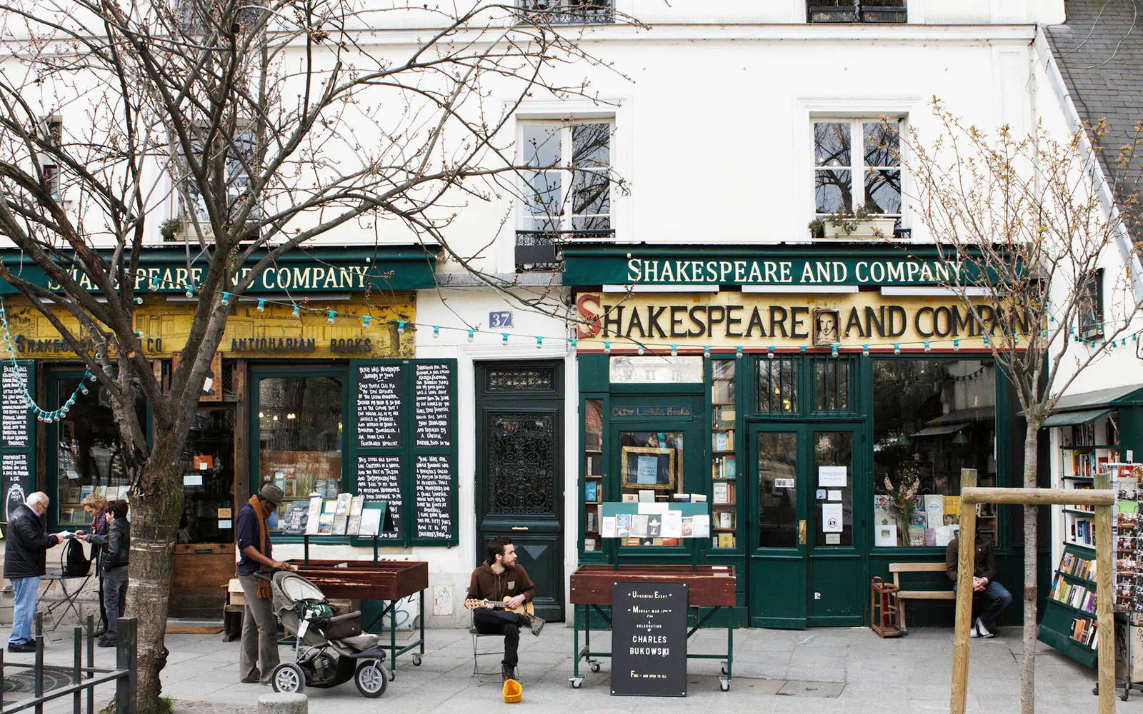 A musician plays outside Shakespeare and Company, Paris's legendary English-language bookshop on the Left Bank
